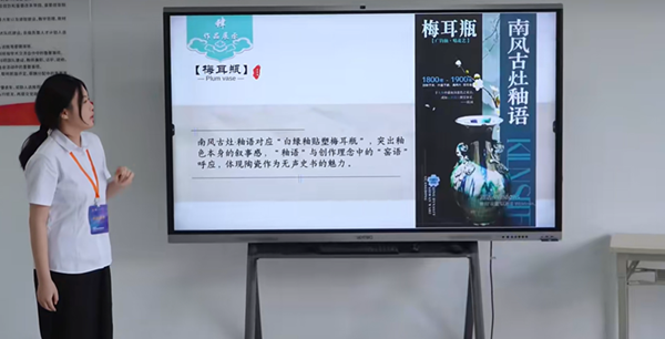图1 决赛现场该校参赛选手莫嘉欣进行作品陈述答辩.png